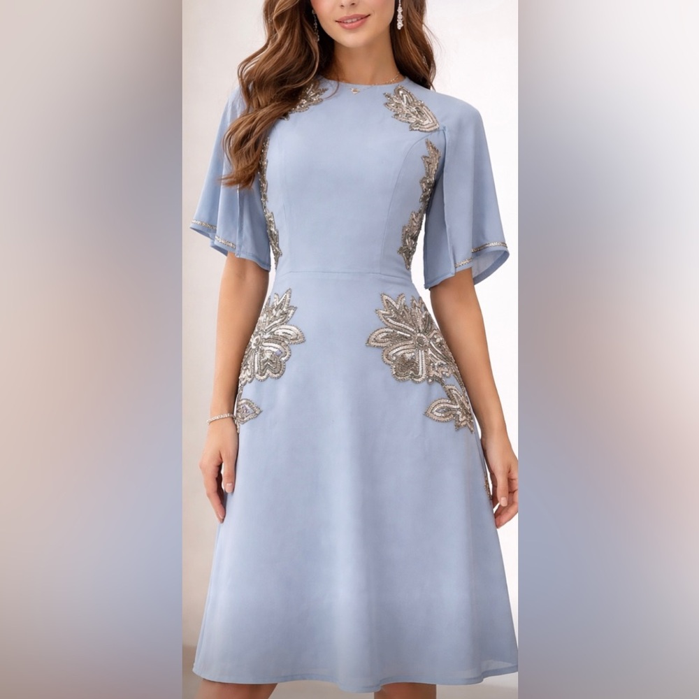 Beautiful and fitting dress.